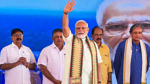 Image of PM Modi giving a speech taking a dig at Shashi Tharoor